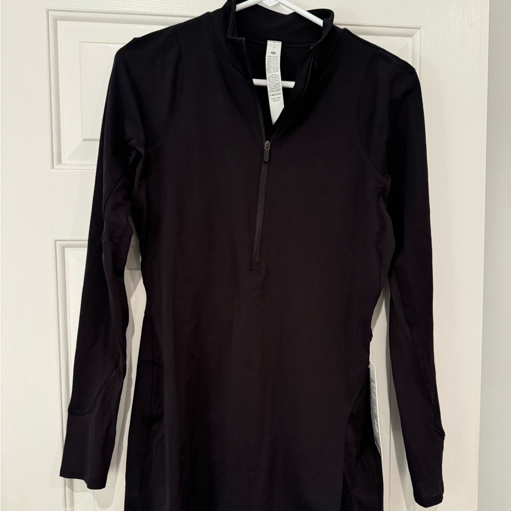 Lululemon tennis dress.  Fitted long sleeve, zip up front w Bike shorts